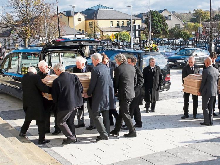 Mourners line out to bid farewell to popular Longford couple