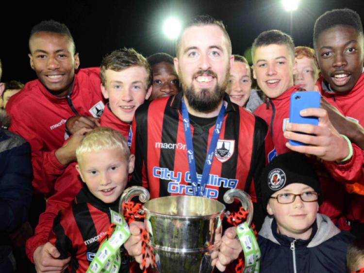 Longford Town club captain Mark Salmon proudly holds the SSE Airtricity League First Division Trophy following the 5-0 win over Shamrock Rovers B at City Calling Stadium back at the beginning of October.