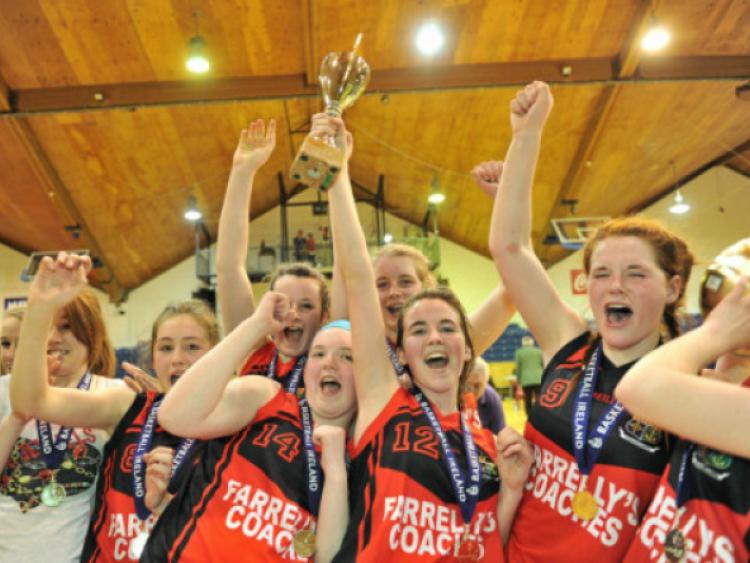 20 March 2013; Mercy Secondary School Ballymahon players celebrate with the cup. U16C Girls - All-Ireland Schools League Finals 2013, Mercy Secondary School Ballymahon, Longford v Colaiste Oiriall, Monaghan, National Basketball Arena, Tallaght, Dublin. Picture credit: Brian Lawless / SPORTSFILE