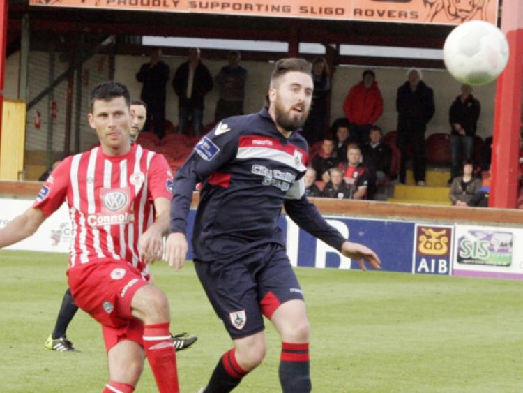 Longford Town player Mark Salmon battling for the ball in the Premier Division league game against Sligo Rovers at the Showgrounds on Saturday evening last.