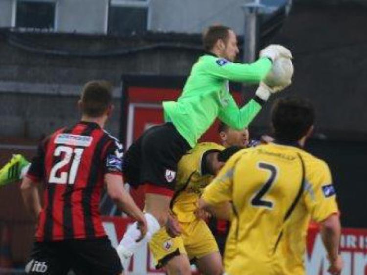 Goalmouth action from the game at Dalymount Park on Friday night last as Longford Town keeper Paul Hunt gathers the ball. Photo: Tiernan Dolan