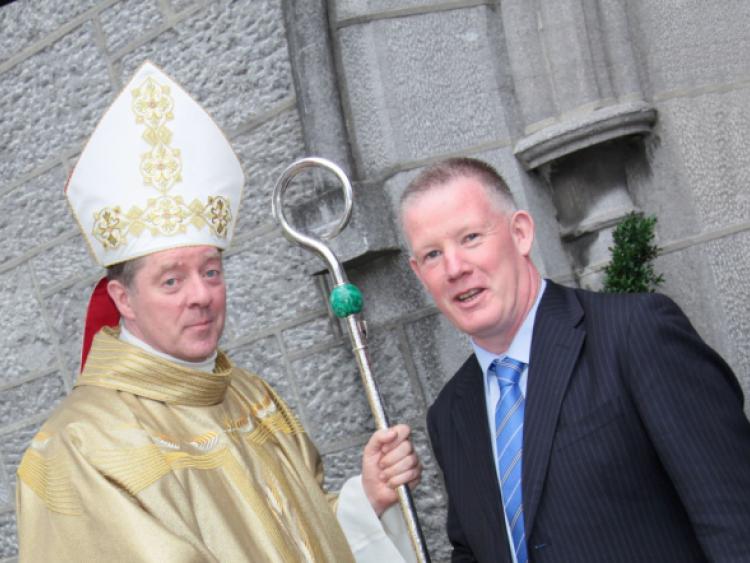 Principal of St Mel's College, Declan Rowley, congratulates Bishop Francis Duffy at St Mary's Pro-Cathedral in Athlone. Photo: Shelley Corcoran