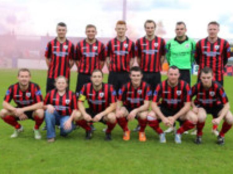The Longford Town team that started against Finn Harps in the final game of the season at Finn Park in Ballybofey on Sunday last. Back row (l to r): Conor O'Brien, Rhys Gorman, Gary Shaw, Tom Morris, Chris Bennion and Peter Hynes. Front row (l to r): Pat Sullivan, Stephen Rice, David O'Sullivan, Pat Flynn and Noel Haverty.  The team mascot in the photo is Davina Dardis.