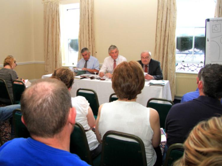 Brian Leahy and Brendan Muldowney from Muldowney & Co with Fintan McGill from Sherry FitzGerald McGill at last week's auction. Photo: Michelle Ghee. www.gphotos.ie