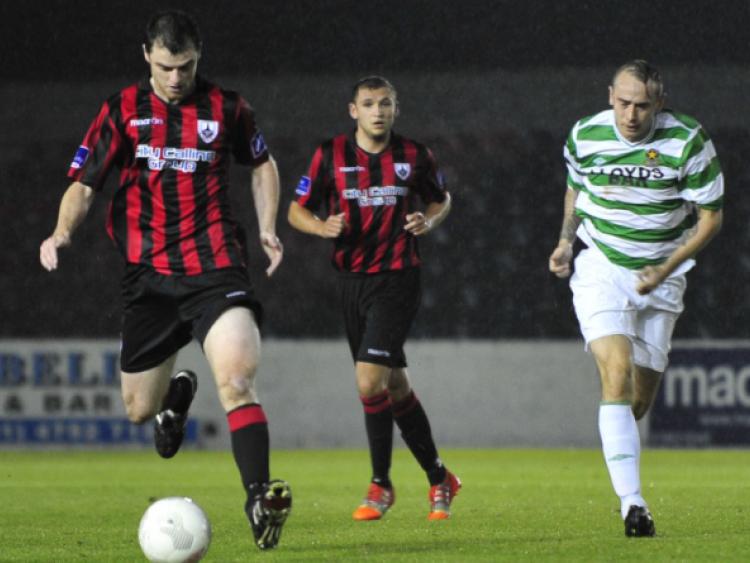 Noel Haverty on the ball for Longford Town with fellow defender Rhys Gorman also in the picture. Action from the FAI Cup quarter-final against Sheriff YC at City Calling Stadium on Friday night last.  Photo: Frank McGrath