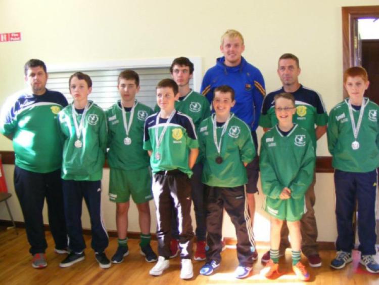 The Killoe Boys U-13 Indoor Soccer squad, silver medal winners, and their mentors pictured with Longford inter-county football keeper Paddy Collum during Saturdays homecoming reception at Ennybegs Community Centre.