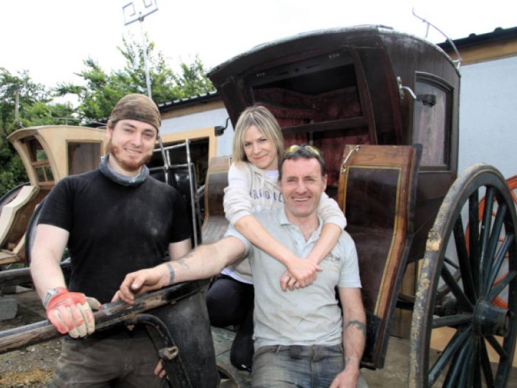Franky Warde (right) with Zen C Melzer and his partner Bridie Corcoran in front of the Hansom cab he constructed for use in film and TV productions. Photo: Michelle Ghee. www.gphotos.ie
