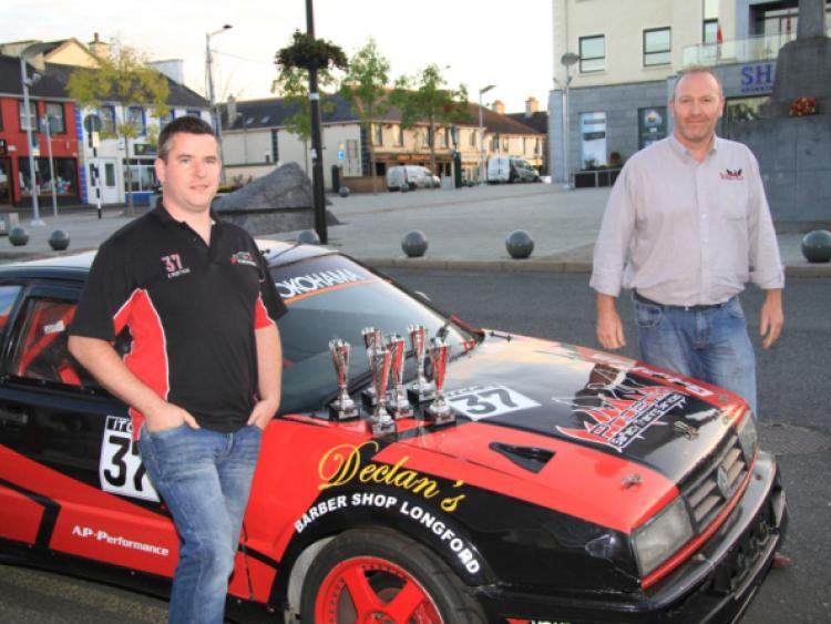 Carrickedmond driver Anthony Murtagh (left) pictured with his six trophies from the 2014 ITCC season, his Volkswagen Corrado which he rebuilt and Paddy McDonnell from Phoenix STS. Photo: Michelle Ghee. www.gphotos.ie