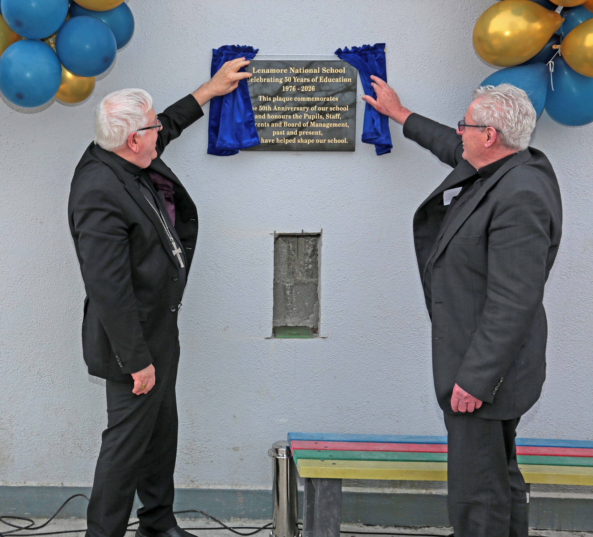 Caption: Bishop Paul Connell with Fr Vinny Connaughton unveiling a plaque to commemorate the 50th Anniversary of Lenamore NS