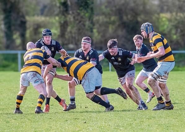 Longford's Man of the Match Shane McGuigan bursts into the Newbridge defence with support from Alan Crowe , Seamus McKeon and Ryan McHugh Photo: Gary Nolan