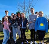 The green-fingered, multi-tasking students of Melview NS, Longford combing tree planting and World Book Day celebrations