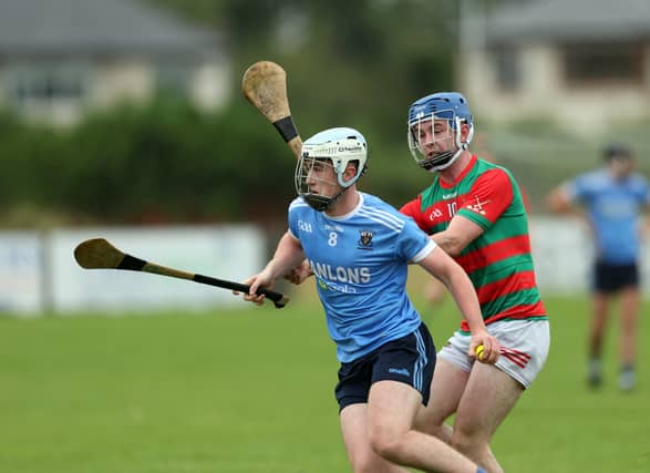 Harry Mulvihill pictured in action for Longford Slashers in this tussle with Wolfe Tones opponent Adam Connaughton in the SHC Round 1 clash at Allen Park Photo: Syl Healy