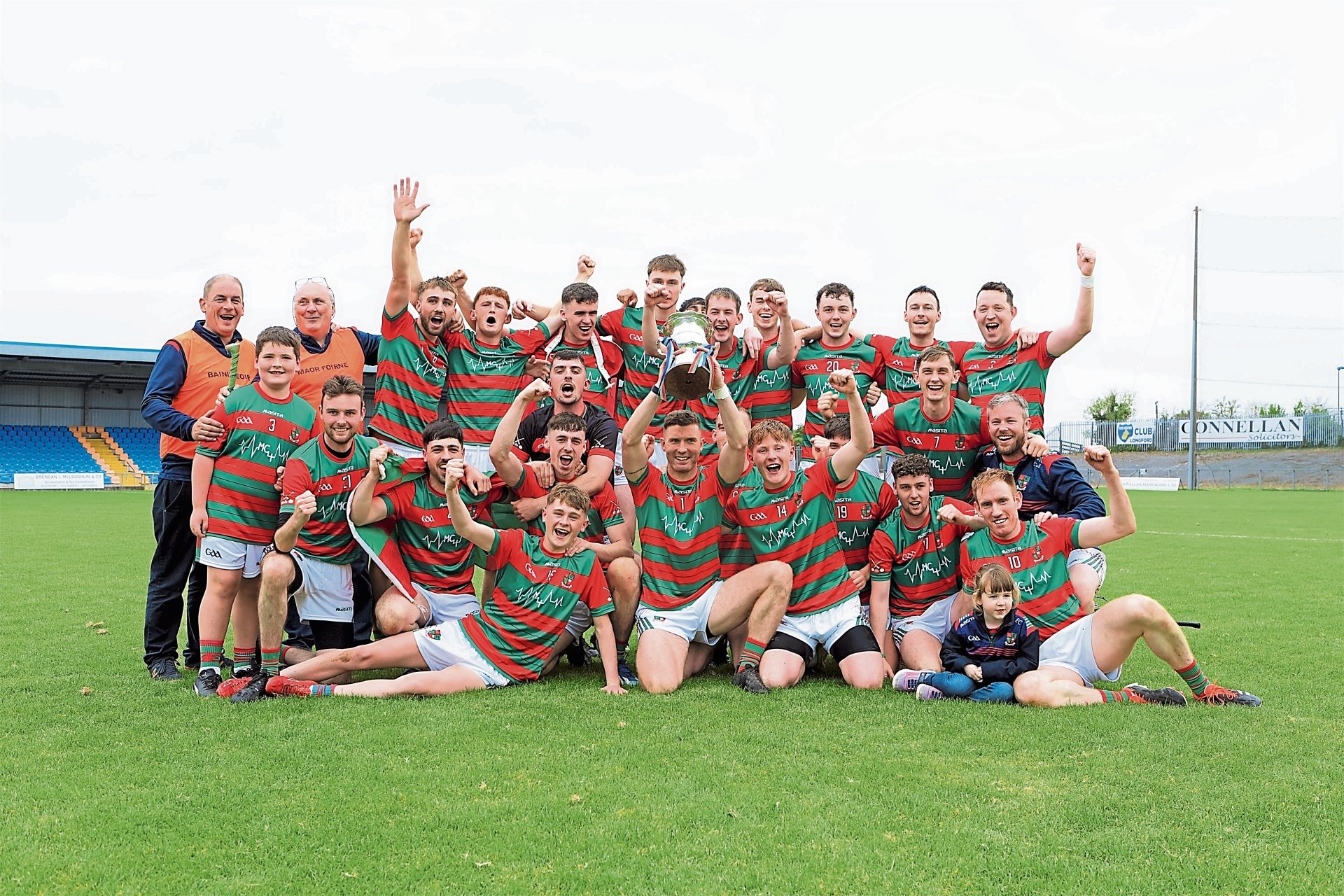 The jubilant Wolfe Tones squad celebrate their 2-15 to 3-10 win over Slashers in last year's Senior Hurling Championship Final with mentors John Lynam and Mattie McLoughlin  Photo: Syl Healy
