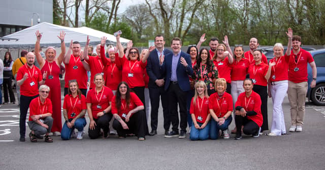 Staff at Dovida Midlands, Dovida Ireland CEO, Shane Jennings and Min for Enterprise, Tourism and Employment, Peter Burke (centre) celebrate the launch of Dovida’s Midlands hub Pic: Thomas Gibbons