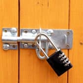 File Photo of padlock on garden shed