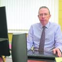 St Christopher's CEO Derek Scanlon at his desk Picture: Shelley Corcoran