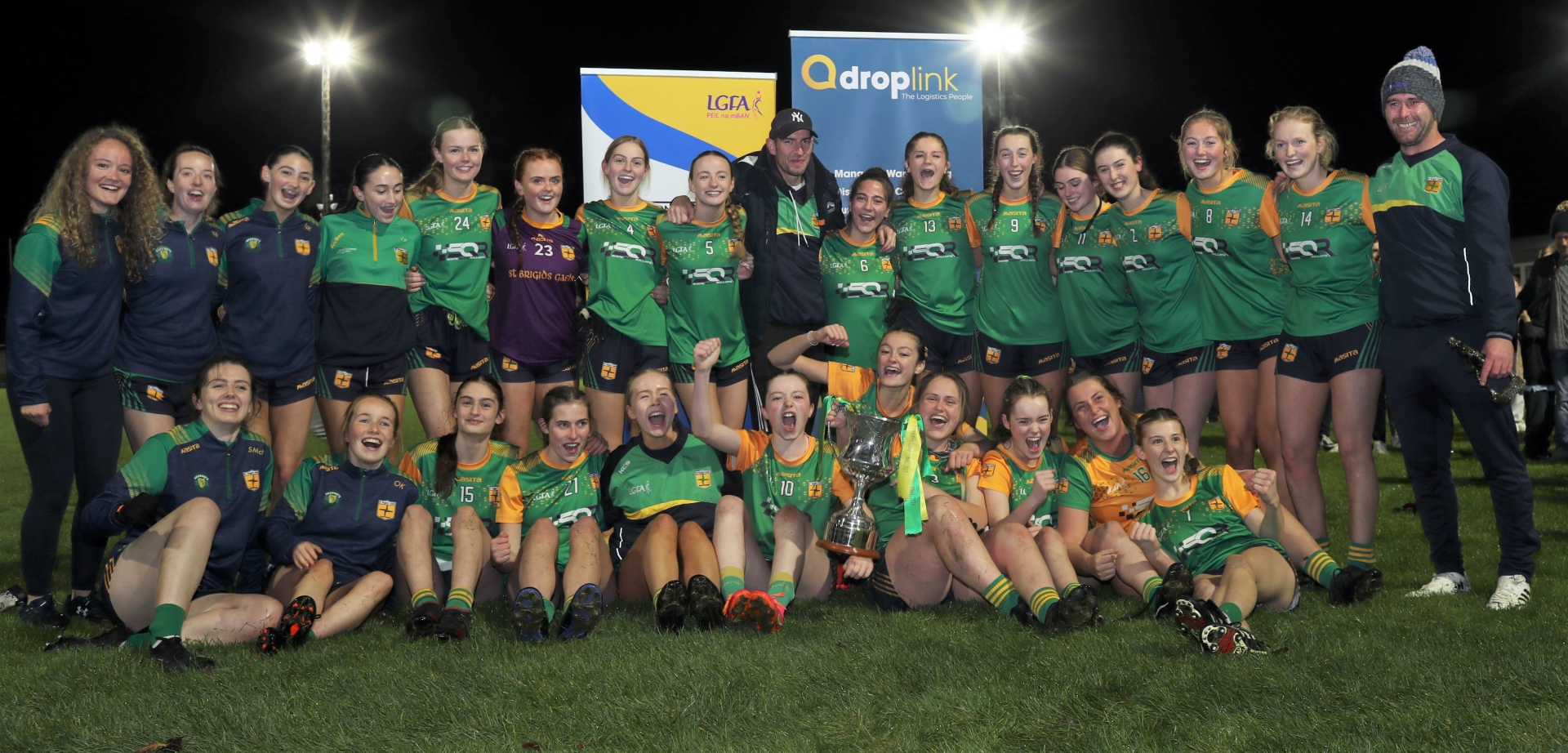 St Brigid's Gaels Ardagh ladies football squad celelebrate their win over Dromard in the Intermediate final replay with mentors Paddy Keenan and Brian Farrell Photo: Syl Healy