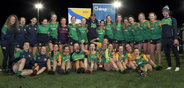 St Brigid's Gaels Ardagh ladies football squad celelebrate their win over Dromard in the Intermediate final replay with mentors Paddy Keenan and Brian Farrell Photo: Syl Healy