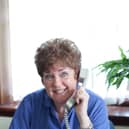 Volunteer mentor Pat on the phone