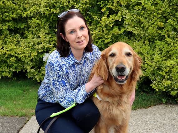 Léan Kennedy and her guide dog, Higgins | PICTURE: Adrian Butler