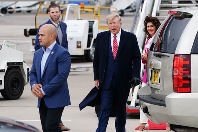 The tycoon’s trip to Scotland comes as he faces legal trouble in his native New York over his business practices.
