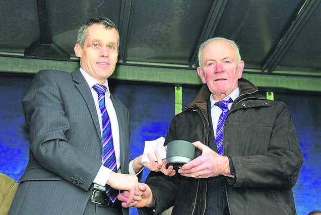 Memories: John Clarke making a presentation to long serving Young Grattans great Brendan Lennon