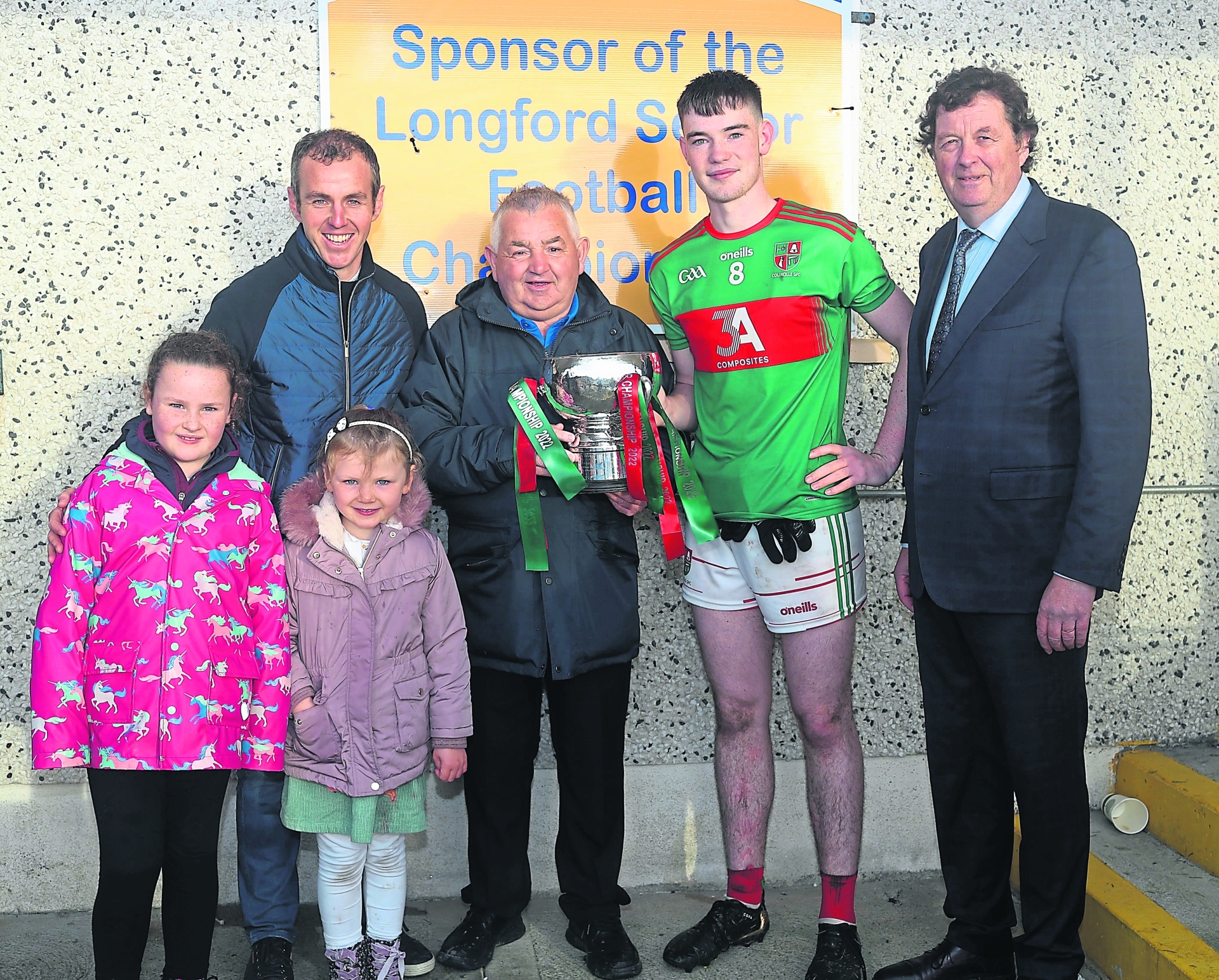 Peter Hanley of Peter Hanley Motors, the Longford Senior Football Championship Sponsors,  presenting the Sean Connolly Cup to Colmcille captain Jack Macken Photo: Syl Healy