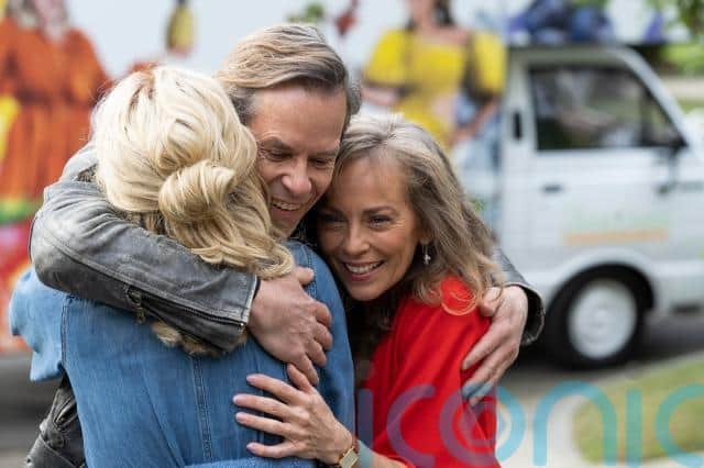 After Charlene shows her typically feisty spirit by nearly breaking into a house – reminiscent of Minogue’s very first scene on the soap in 1986 when Scott caught her breaking into her mother’s home and got punched for his troubles – the couple finally get their reunion with Jane and Mike to bring the four friends back together.