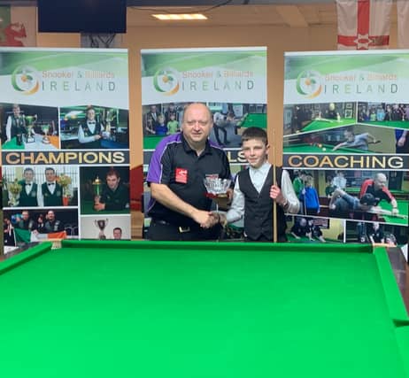 Longford’s Joe Shannon who won the second Snooker & Billiards Ireland U-14 Snooker Ranking event of the season accepting his trophy from National Coach PJ Nolan
