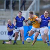 Longford defender Patrick Fox and keeper Paddy Collum trying to stop Antrim attacker Odhran Eastwood in this goal chance  Photo: Ken Keenan