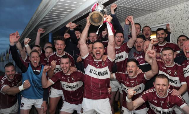 Delight for the Mullinalaghta players as captain Donal McElligott lifts the Connolly Cup following their win over Mostrim Photo: Syl Healy