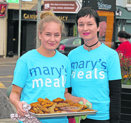 Kate Herterich and Colette Farrell pictured welcoming Mary's Meals walkers to Longford in 2019. A group is arriving in Longford today, Wednesday, August 11 Picture: Shelley Corcoran