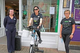 Natasha Feeney, Irmante Balciunaite and Monica Tully at the Specsavers static cycle ride (bike from The Mall Sports Centre) that raised €1,044 for St Joseph’s Care Centre, Longford