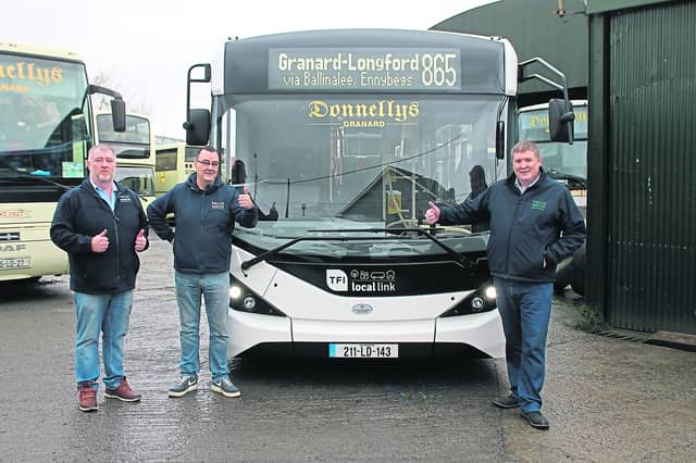 Pat and Alan Donnelly with TFI Local Link Longford Westmeath Roscommon manager Damien O’Neill and the brand new bus ready to take up service to Longford