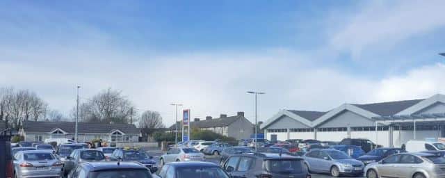 A view outside of Aldi's thronged car park summed up the woman's overall sense of exasperation at the lengthening queues.