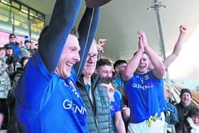 Longford captain Michael Quinn raising the O'Byrne Cup on Saturday