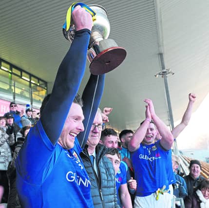 Longford captain Michael Quinn raising the O'Byrne Cup on Saturday