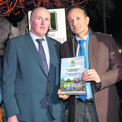 ICMSA's Pat McCormack giving Taoiseach Leo Varadkar a copy of their Guide To Election 2020 on Tuesday night last in Adare, Co Limerick