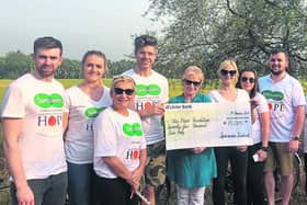 Specsavers delegation to Kolkata presenting cheque to Maureen Forrest. Specsavers Longford Director Keith McCallion far right.