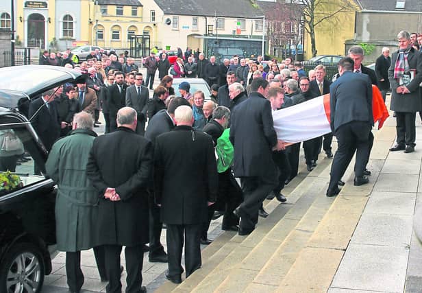 The coffin of the late Peter Kelly is solemnly carried into St Mel's Cathedral for his Funeral Mass last Saturday where hundreds of mourners gathered to pay their final respects.