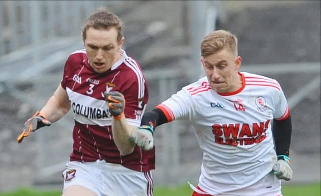 Mullinalaghta full-back Patrick Fox in a tussle with Eire Og (Carlow) forward Darragh O'Brien. Action from the Leinster Club SFC semi-final on Sunday last. Photo: Declan Gilmore
