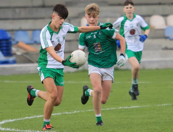 Adam Donnelly on the ball for Killoe Og ahead of Clonguish Og opponent Matthew Flynn. Action from the U-14 'A' Championship Final at Pearse Park on Saturday. Photo: Syl Healy