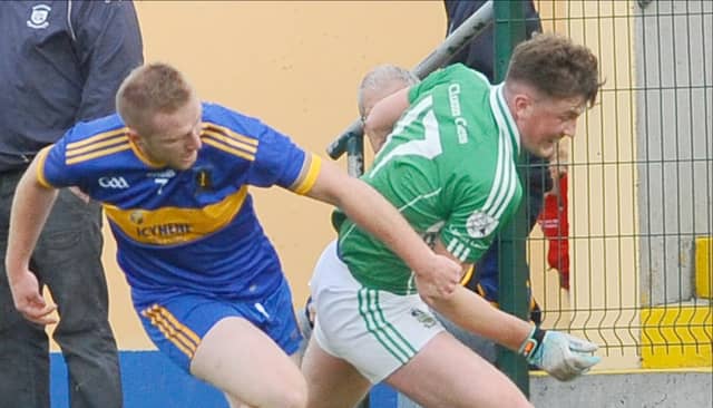 Clonguish's Packie Molloy in a tussle with Dromard's Peter Reynolds. Action from the SFC quarter-final replay at Glennon Brothers Pearse Park on Sunday. Photo: Declan Gilmore