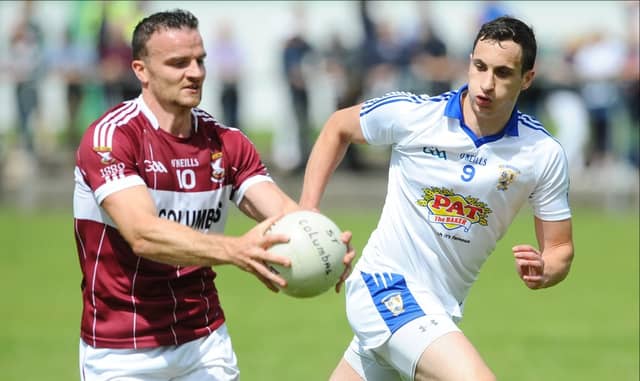 Donal McElligott on the attack for Mullinalaghta ahead of Granard opponent Darren Gallagher. Action from the SFC Group 2 game at Emmet Park, Killoe on Sunday. Photo: Declan Gilmore