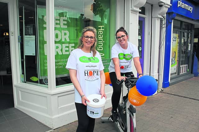 Niamh Kiernan and Elizabeth Campbell taking part in the Specsavers fundraiser. For more info on the optical and hearing offering at Specsavers Longford, or to make an appointment, call 043 333 6276