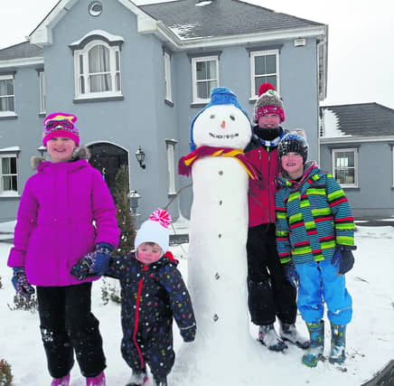 Aaron, Mia, Oisin and Fiach Kiernan having fun in the snow in Drumlish