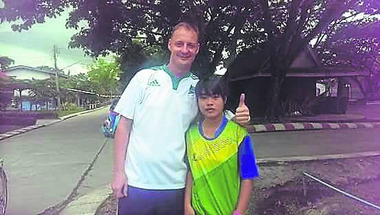 The late John Malone pictured with one of the many students who looked up to him.