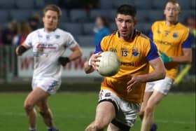 Robbie Smyth on the attack for Longford against Laois in the National Football League Division 3 game at O'Moore Park on Saturday evening last with Barry O'Farrell in the background. Photo: Syl Healy.