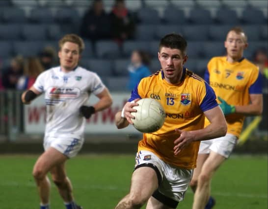 Robbie Smyth on the attack for Longford against Laois in the National Football League Division 3 game at O'Moore Park on Saturday evening last with Barry O'Farrell in the background. Photo: Syl Healy.