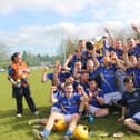 The delighted Longford senior hurlers celebrate after winning the National League Division 3B Final on Sunday.  Photo: Coilin Duffy